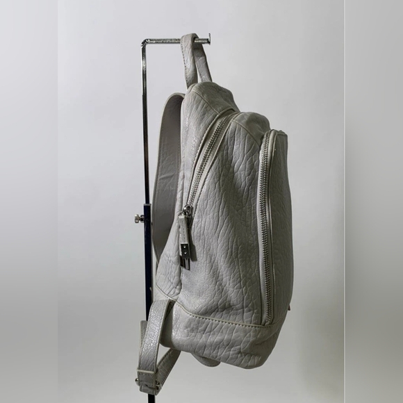 dove grey leather backpack Genuine and canvas with side pockets grain leather and a cotton twill innershell NEW Vince Camuto Designer Dove
